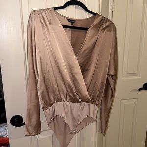 Two toned, polyester silk looking body suit.